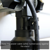 Load image into Gallery viewer, Close up of the KMH-2500R 2.5KW Free Standing Infrared Heater&#39;s power cable with the caption &quot;keep the power cable safely tucked away against the stand&quot;