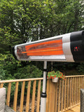 Load image into Gallery viewer, Close up of the KMH-3000R 3KW Free Standing Infrared Heater&#39;s heating lamp with greenery in the background